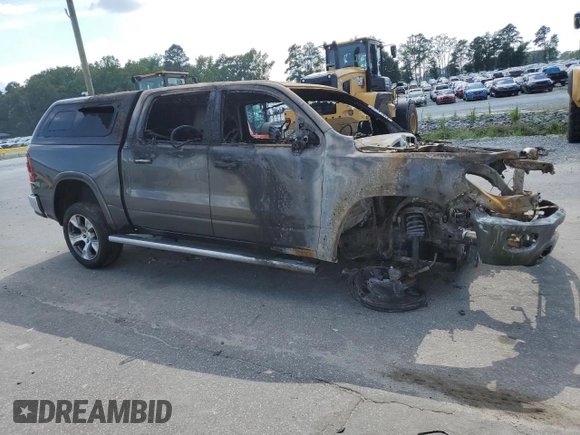 2020 Ram 1500 Laramie with VIN 1C6SRFJM9LN344248, listed as a Copart auction lot 63751575 with Not provided miles and Salvage title. Bid and sale history available at DreamBid. Image 4.
