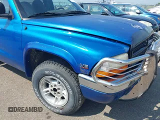 1998 Dodge Dakota SLT with VIN 1B7FL26X8WS651715, listed as a IAAI auction lot 42665446 with Not provided miles and . Bid and sale history available at DreamBid. Image 6.