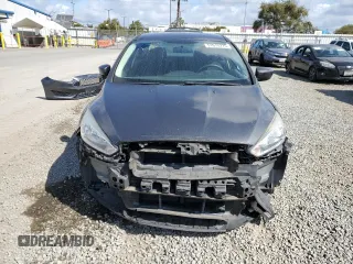 2018 Ford Focus SE with VIN 1FADP3F24JL231626, listed as a Copart auction lot 51015275 with 97,054 mi miles and Salvage Title. Bid and sale history available at carsss.com. Image 5.