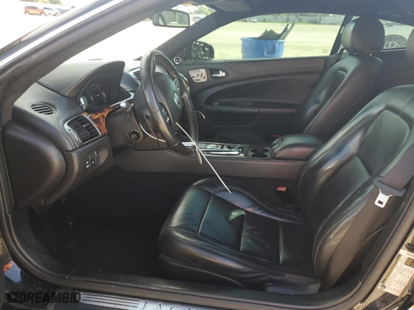 2010 Jaguar XK with VIN SAJWA4DC1AMB38762, listed as a Copart auction lot 73865884 with 98,030 mi miles and Salvage Title. Bid and sale history available at carsss.com. Image 7.