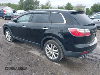 2012 Mazda CX-9 Grand Touring z VIN JM3TB3DV1C0360212, wystawiony jako IAAI lot #42232584 z przebiegiem 99 582 mil mil oraz . Historia ofert i sprzedaży dostępna na DreamBid. Obrazek 3.