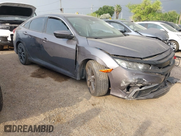 2021 Honda Civic LX z VIN 2HGFC2F64MH555769, wystawiony jako IAAI lot #41954218 z przebiegiem 58 785 mil mil oraz . Historia ofert i sprzedaży dostępna na DreamBid. Obrazek 1.