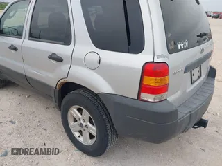 2006 Ford Escape Hybrid with VIN 1FMCU96H56KD26694, listed as a IAAI auction lot 42369824 with 197,995 mi miles and . Bid and sale history available at DreamBid. Image 6.