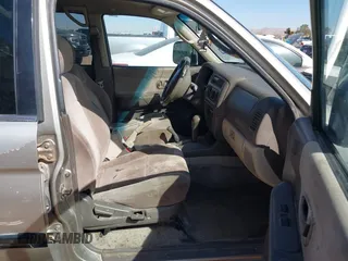 2000 Mitsubishi Montero LS z VIN JA4MT31HXYP020087, wystawiony jako IAAI lot #41540609 z przebiegiem 262 474 mil mil oraz . Historia ofert i sprzedaży dostępna na DreamBid. Obrazek 5.