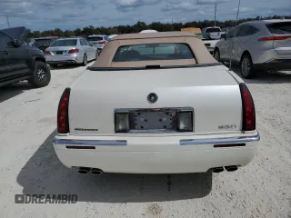 2002 Cadillac Eldorado z VIN 1G6EL12Y32B102263, wystawiony jako Copart lot #77108634 z przebiegiem 43 162 mil mil oraz Nie do naprawy • Non repairable. Historia ofert i sprzedaży dostępna na DreamBid. Obrazek 6.