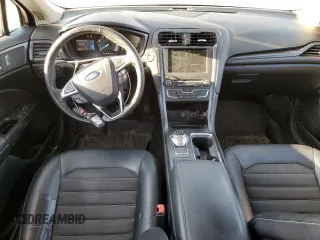 2018 Ford Fusion SE z VIN 3FA6P0H71JR107704, wystawiony jako Copart lot #75017244 z przebiegiem 202 999 mil mil oraz Nie do naprawy • Non repairable. Historia ofert i sprzedaży dostępna na DreamBid. Obrazek 8.
