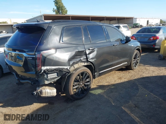 2020 Cadillac XT6 AWD Sport with VIN 1GYKPGRS1LZ170931, listed as a IAAI auction lot 40656458 with 80,168 mi miles and . Bid and sale history available at DreamBid. Image 4.