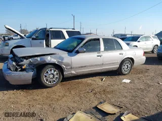 2006 Mercury Grand Marquis GS with VIN 2MEFM74V86X631584, listed as a IAAI auction lot 41635826 with 128,908 mi miles. Bid and sale history available at carsss.com. Image 14.