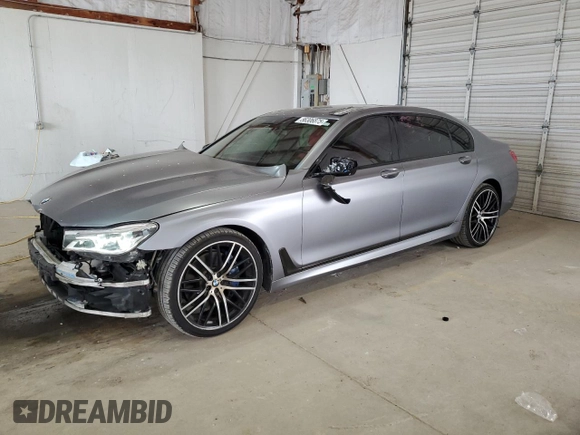 2017 BMW 7 Series 750i with VIN WBA7F0C31HGM22359, listed as a Copart auction lot 56306875 with 90,642 mi miles and Salvage title. Bid and sale history available at DreamBid. Image 1.