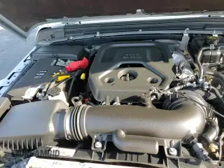 2024 Jeep Wrangler Sahara с VIN 1C4PJXEN2RW129215, выставлен на аукционе Copart как лот 69625995 с пробегом 44 323 миль миль и Списание • Salvage title. История ставок и продаж доступна на DreamBid. Изображение 16.