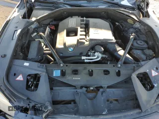 2011 BMW 7 Series 740i with VIN WBAKA4C51BC612629, listed as a Copart auction lot 77372234 with 164,471 mi miles and Salvage Title. Bid and sale history available at carsss.com. Image 11.