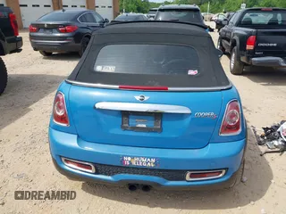 2013 MINI Convertible S with VIN WMWZP3C53DT705016, listed as a IAAI auction lot 42155802 with Not provided miles and . Bid and sale history available at DreamBid. Image 16.