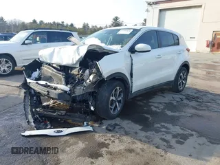 2021 Kia Sportage LX with VIN KNDPMCACXM7901175, listed as a IAAI auction lot 41588890 with 94,404 mi miles and . Bid and sale history available at carsss.com. Image 2.