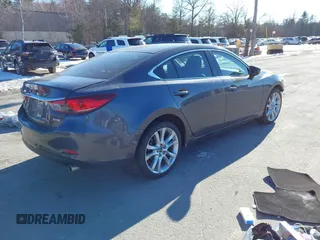 2015 Mazda 6 i Touring with VIN JM1GJ1V60F1170067, listed as a IAAI auction lot 41259559 with 131,055 mi miles and . Bid and sale history available at DreamBid. Image 4.