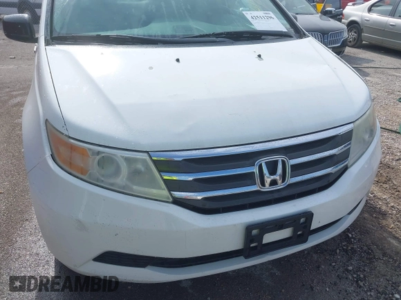2011 Honda Odyssey EX-L with VIN 5FNRL5H60BB026171, listed as a IAAI auction lot 42511296 with 288,827 mi miles and . Bid and sale history available at DreamBid. Image 6.