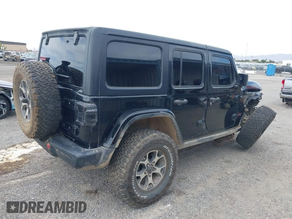 2022 Jeep Wrangler Unlimited Rubicon with VIN 1C4HJXFN2NW134024, listed as a IAAI auction lot 42248188 with 41,899 mi miles and . Bid and sale history available at DreamBid. Image 4.