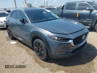 2023 Mazda CX-30 S Preferred with VIN 3MVDMBCM3PM559029, listed as a IAAI auction lot 42558593 with 7,818 mi miles and . Bid and sale history available at DreamBid. Image 1.