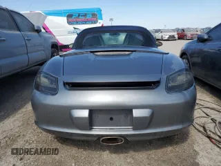 2005 Porsche Boxster с VIN WP0CA29875U711919, выставлен на аукционе Copart как лот 74299934 с пробегом Не указан миль и На запчасти • Non repairable. История ставок и продаж доступна на DreamBid. Изображение 6.