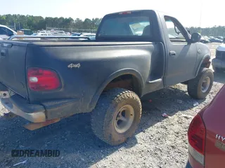 1997 Ford F-150 with VIN 1FTDF0864VKD06980, listed as a IAAI auction lot 42230820 with 174,174 mi miles and . Bid and sale history available at DreamBid. Image 4.