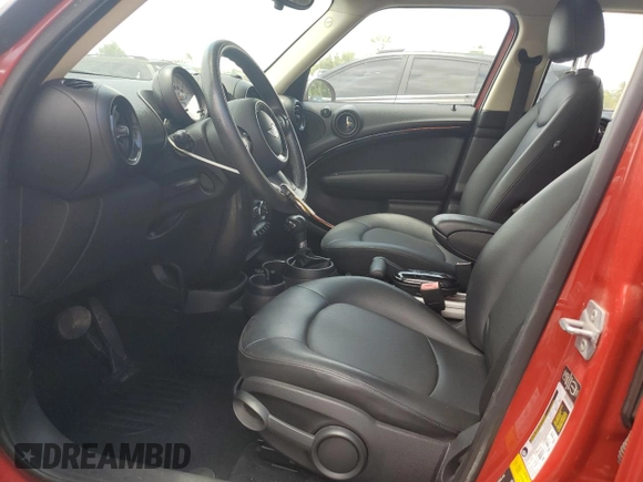 2014 MINI Countryman with VIN WMWZB3C57EWR36323, listed as a Copart auction lot 55098765 with 124,849 mi miles and Non Repairable. Bid and sale history available at DreamBid. Image 7.