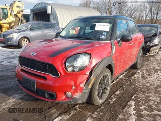 2013 MINI Countryman S z VIN WMWZC3C58DWP22372, wystawiony jako IAAI lot #41523123 z przebiegiem 50 410 mil mil oraz . Historia ofert i sprzedaży dostępna na DreamBid. Obrazek 6.