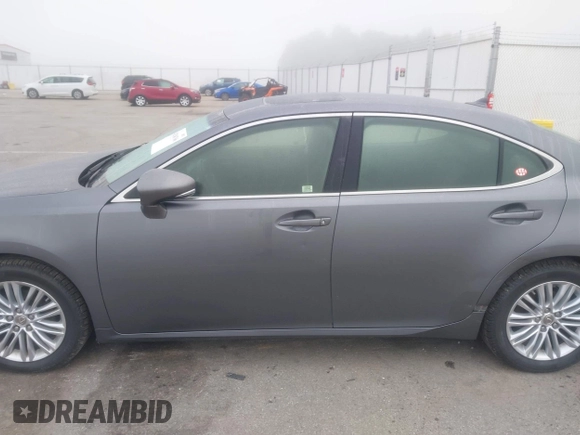 2014 Lexus ES 330 z VIN JTHBK1GGXE2148484, wystawiony jako IAAI lot #42186766 z przebiegiem 117 217 mil mil oraz . Historia ofert i sprzedaży dostępna na DreamBid. Obrazek 14.