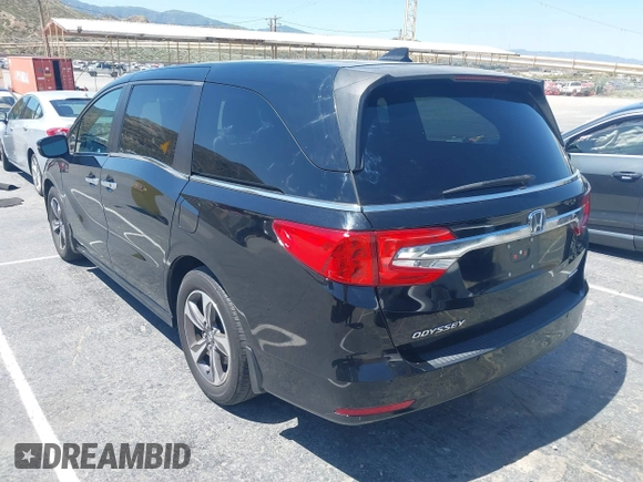 2018 Honda Odyssey Touring with VIN 5FNRL6H8XJB026247, listed as a IAAI auction lot 42298961 with 66,571 mi miles and . Bid and sale history available at DreamBid. Image 3.