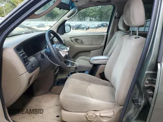 2002 Mazda Tribute LX with VIN 4F2YU09122KM55085, listed as a Copart auction lot 71604184 with 185,158 mi miles and Salvage Title. Bid and sale history available at carsss.com. Image 7.