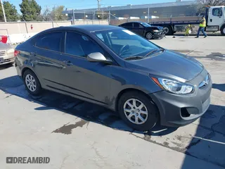 2012 Hyundai Accent GLS with VIN KMHCT4AE9CU204164, listed as a IAAI auction lot 41876272 with 170,068 mi miles. Bid and sale history available at carsss.com. Image 1.