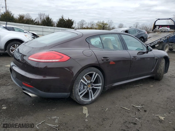 2015 Porsche Panamera 4 with VIN WP0AA2A7XFL001690, listed as a Copart auction lot 40765024 with 86,770 mi miles. Bid and sale history available at carsss.com. Image 3.