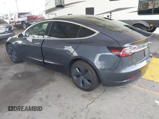 2020 Tesla Model 3 Standard Range Plus with VIN 5YJ3E1EA8LF743405, listed as a IAAI auction lot 41923592 with 81,901 mi miles. Bid and sale history available at carsss.com. Image 3.
