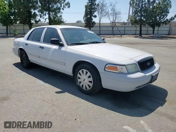 2011 Ford Police Interceptor with VIN 2FABP7BV4BX167977, listed as a Copart auction lot 61819025 with 104,769 mi miles and Salvage title. Bid and sale history available at DreamBid. Image 13.