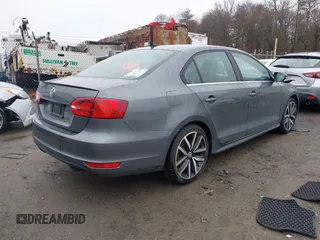 2012 Volkswagen Jetta GLI Autobahn with VIN 3VW5A7AJ5CM410777, listed as a IAAI auction lot 41729287 with 116,427 mi miles and . Bid and sale history available at DreamBid. Image 4.