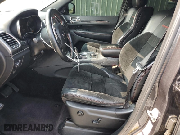 2017 Jeep Grand Cherokee Trailhawk with VIN 1C4RJFLT3HC614449, listed as a Copart auction lot 58559335 with 153,051 mi miles and Salvage title. Bid and sale history available at DreamBid. Image 7.