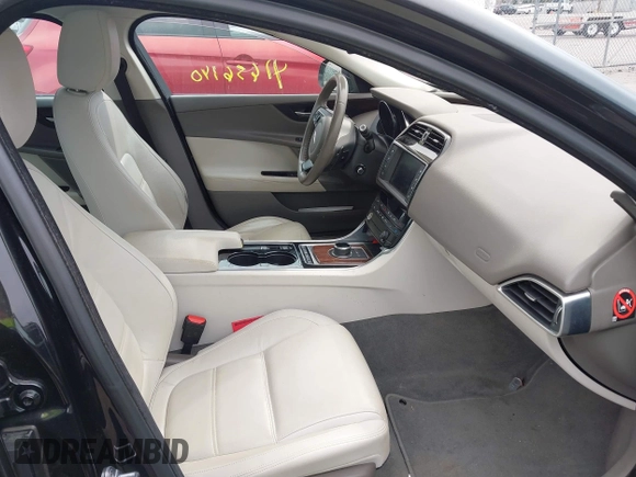 2017 Jaguar XE 25t Prestige with VIN SAJAE4BG5HA963099, listed as a IAAI auction lot 41656140 with 123,863 mi miles. Bid and sale history available at carsss.com. Image 5.