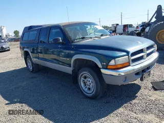 1999 Dodge Dakota SLT with VIN 1B7GG22Y2XS157214, listed as a IAAI auction lot 39776504 with 144,928 mi miles and . Bid and sale history available at carsss.com. Image 1.