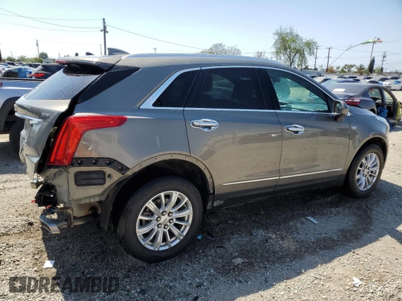 2017 Cadillac XT5 FWD with VIN 1GYKNARS1HZ265368, listed as a Copart auction lot 55365855 with 108,176 mi miles and Salvage title. Bid and sale history available at DreamBid. Image 3.