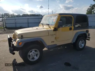 2000 Jeep Wrangler Sport with VIN 1J4FA49SXYP745676, listed as a Copart auction lot 63096755 with 147,226 mi miles and Salvage title. Bid and sale history available at DreamBid. Image 1.