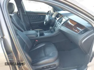 2016 Ford Taurus Limited z VIN 1FAHP2F81GG109548, wystawiony jako IAAI lot #42177871 z przebiegiem 168 611 mil mil oraz . Historia ofert i sprzedaży dostępna na DreamBid. Obrazek 5.