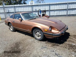 1982 Datsun 280ZX z VIN JN1HZ04S0CX433451, wystawiony jako Copart lot #53912864 z przebiegiem 200 629 mil mil oraz Tytuł czysty. Historia ofert i sprzedaży dostępna na DreamBid. Obrazek 4.