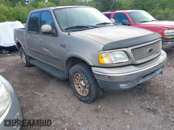 2003 Ford F-150 XLT with VIN 1FTRW08L63KD06455, listed as a IAAI auction lot 41988549 with 138,168 mi miles. Bid and sale history available at carsss.com. Image 1.