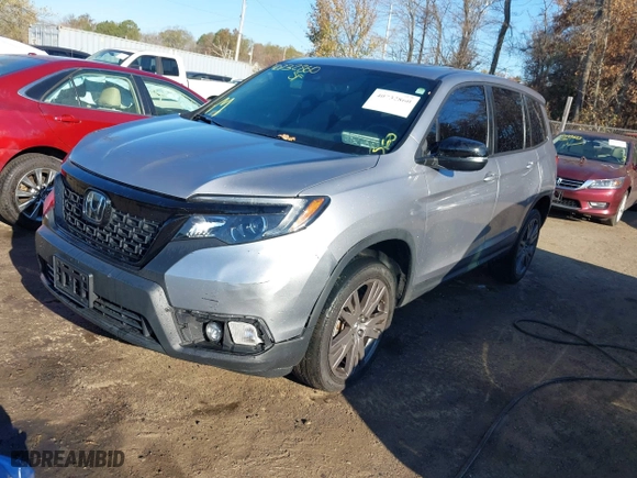 2021 Honda Passport EX-L with VIN 5FNYF8H54MB042677, listed as a IAAI auction lot 40732860 with 63,698 mi miles. Bid and sale history available at carsss.com. Image 17.