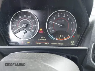 2015 BMW 2 Series 228i with VIN WBA1F5C59FV257447, listed as a IAAI auction lot 41706206 with 119,086 mi miles. Bid and sale history available at carsss.com. Image 7.