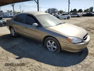 2003 Ford Taurus SES Standard z VIN 1FAFP55253G138373, wystawiony jako Copart lot #57124335 z przebiegiem 89 136 mil mil oraz Szkoda całkowita • Salvage title. Historia ofert i sprzedaży dostępna na DreamBid. Obrazek 4.