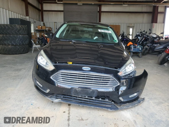 2018 Ford Focus Titanium with VIN 1FADP3N25JL242748, listed as a Copart auction lot 62106155 with 152,766 mi miles and Salvage title. Bid and sale history available at DreamBid. Image 5.