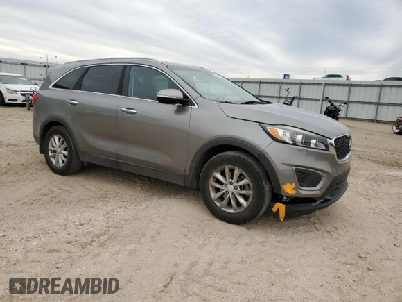 2016 Kia Sorento LX with VIN 5XYPG4A33GG137500, listed as a Copart auction lot 45291405 with 97,893 mi miles and Salvage Title. Bid and sale history available at DreamBid. Image 4.