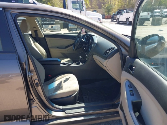 2015 Kia Optima LX with VIN 5XXGM4A74FG396236, listed as a IAAI auction lot 42165862 with 127,383 mi miles. Bid and sale history available at carsss.com. Image 5.