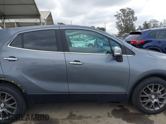 2019 Buick Encore Sport Touring with VIN KL4CJ1SB3KB744708, listed as a IAAI auction lot 42025141 with 127,220 mi miles. Bid and sale history available at carsss.com. Image 14.