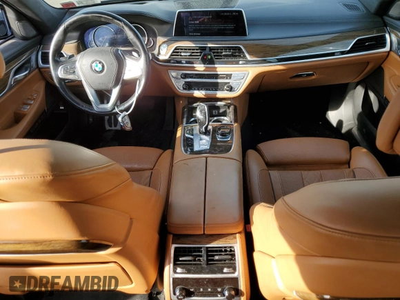 2016 BMW 7 Series 750i xDrive с VIN WBA7F2C53GG420706, выставлен на аукционе Copart как лот 76697534 с пробегом 59 885 миль миль и Чистый • Clean title. История ставок и продаж доступна на DreamBid. Изображение 8.