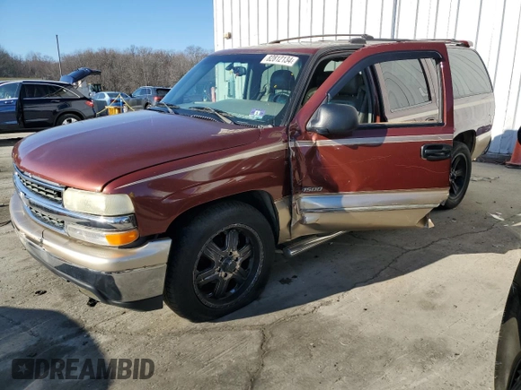 2000 Chevrolet Suburban LT with VIN 3GNEC16T0YG204106, listed as a Copart auction lot 82812134 with 211,674 mi miles and Salvage Title. Bid and sale history available at carsss.com. Image 1.